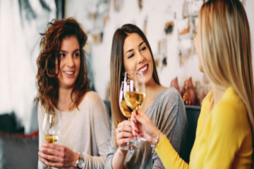 tagAlt.Women drinking wine together white wine 8